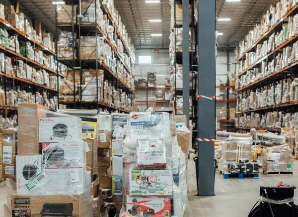 warehouse shelves with mint-condition returns