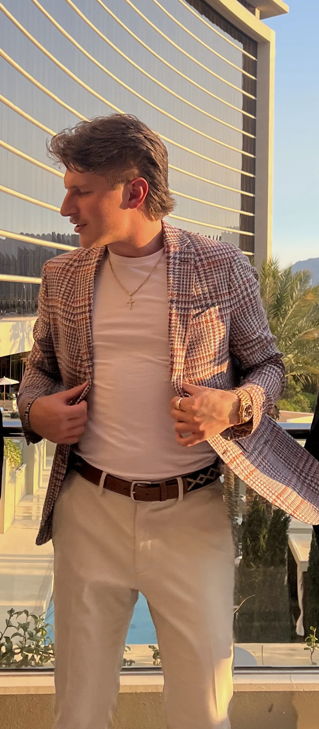 Colton Stephens dressed for a formal occasion in the golden-hour light